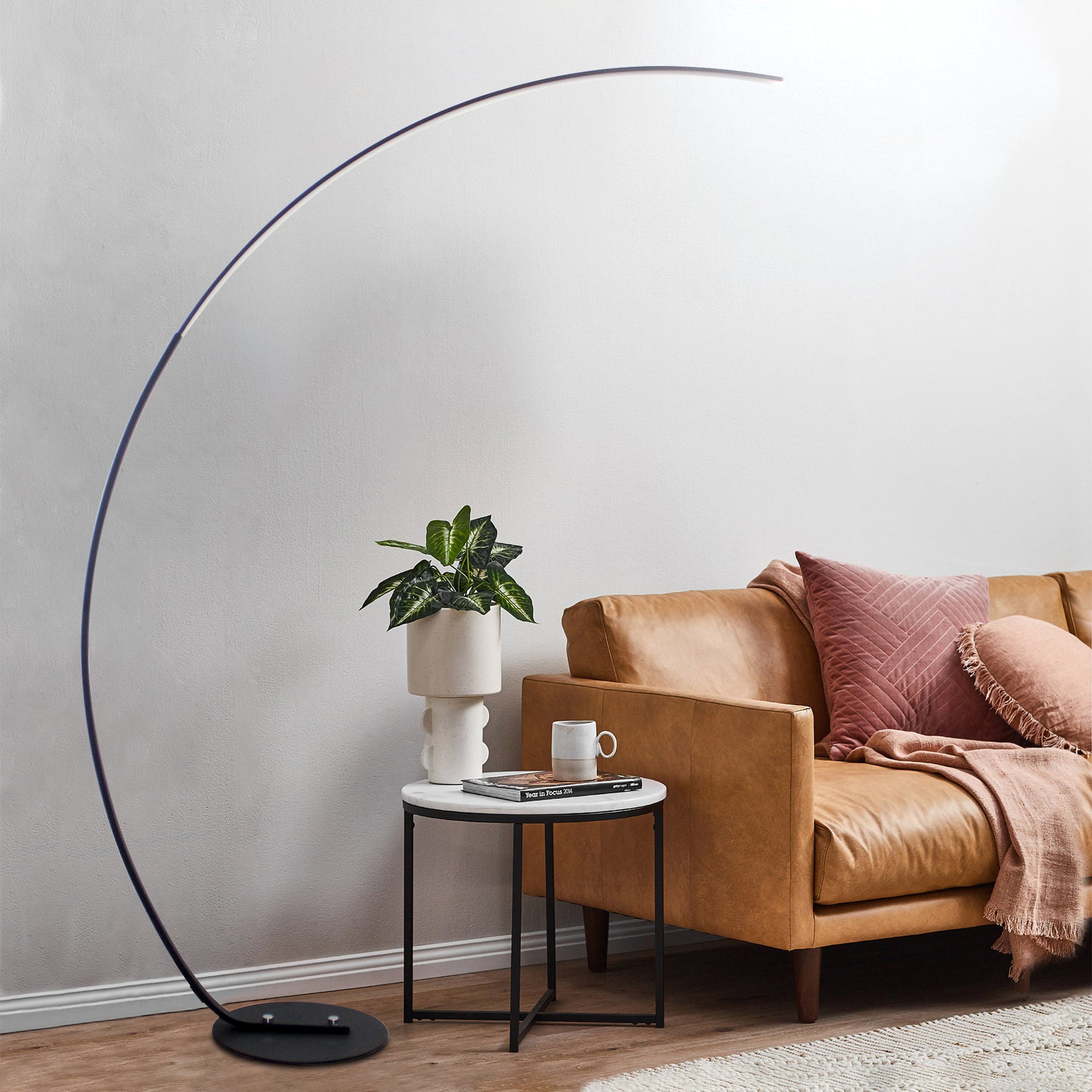 RGBW Modern Curve Floor Lamp with sleek curved design, perfect for adding elegant and energy-efficient lighting to modern living spaces.