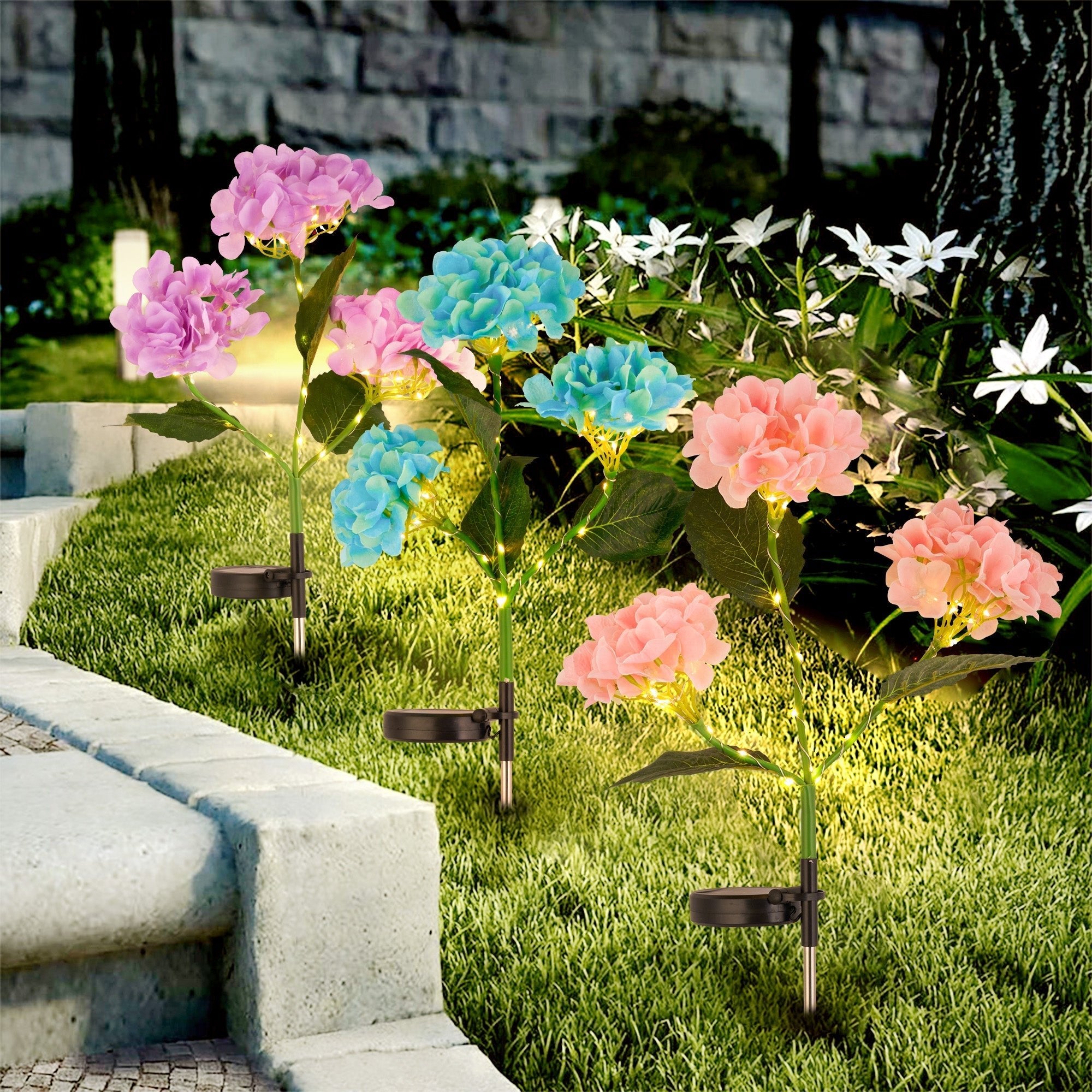 Solar Powered Hydrangea Pathway Light blooming in soft colors lighting up a garden pathway sustainably.