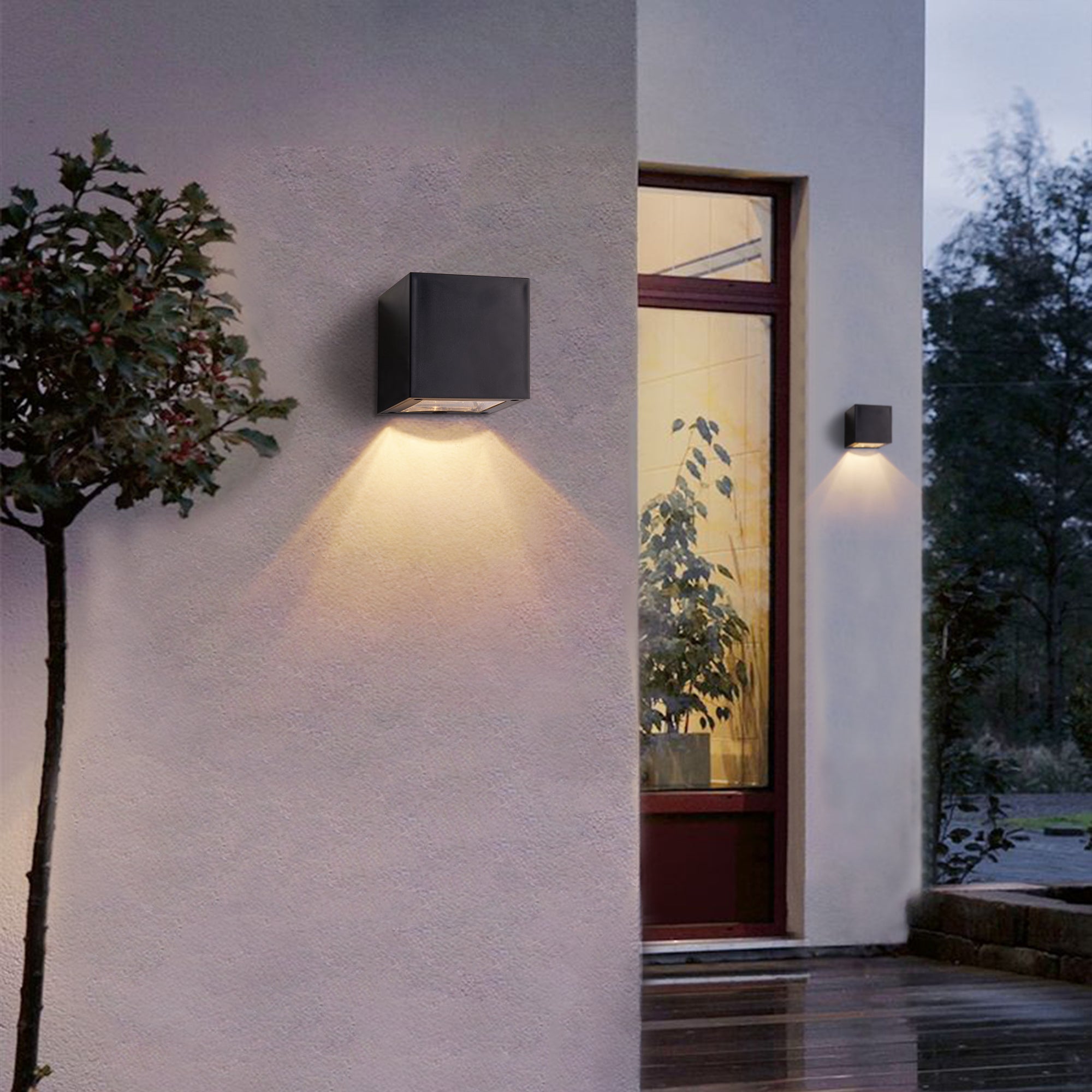 Solar Powered Outdoor Landscape Wall Lights illuminating a modern exterior wall without wiring, perfect for patios and gardens.