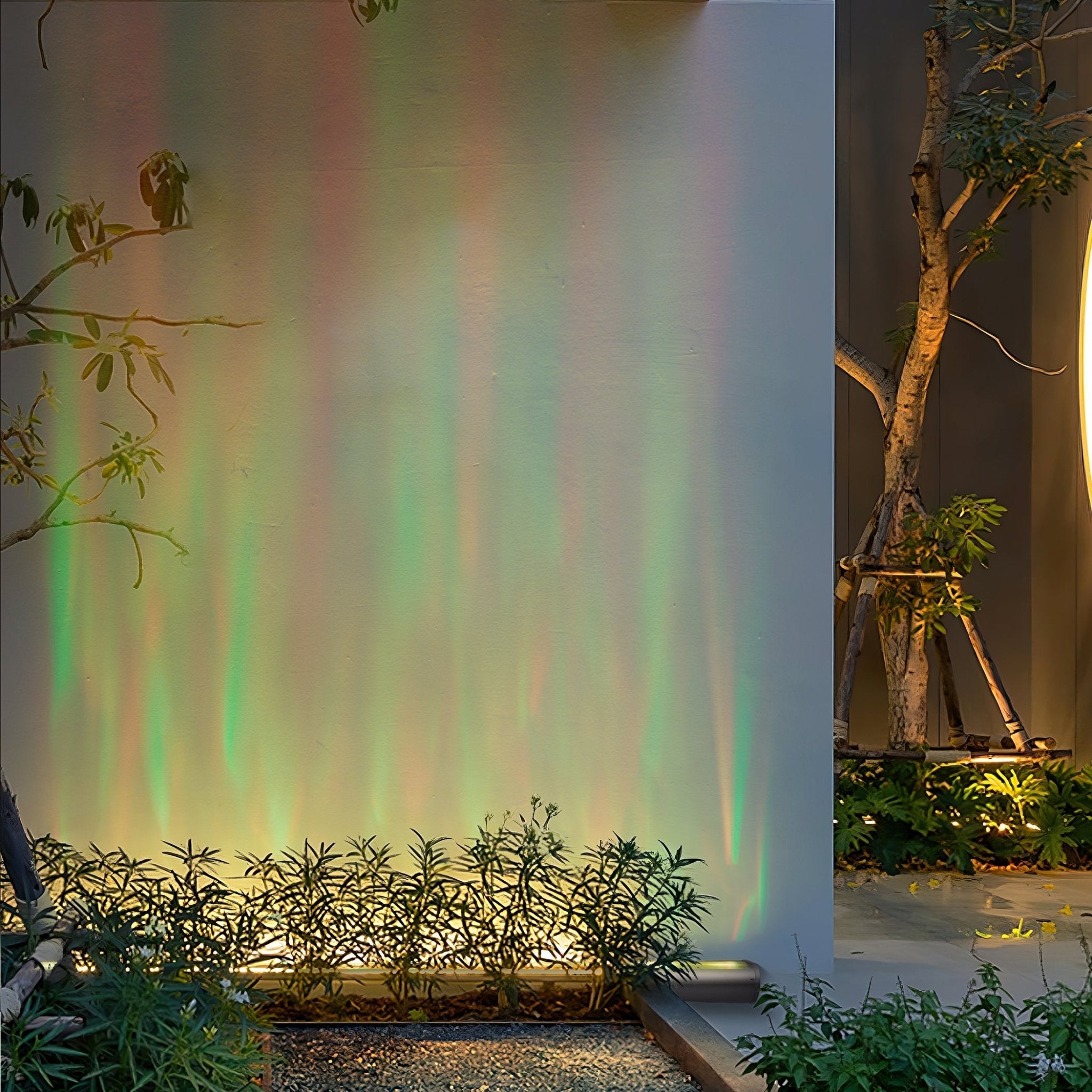 Waterproof Outdoor RGBW Ocean Wave Lights projecting vibrant colors on a garden wall creating a mesmerizing aquatic ambiance.