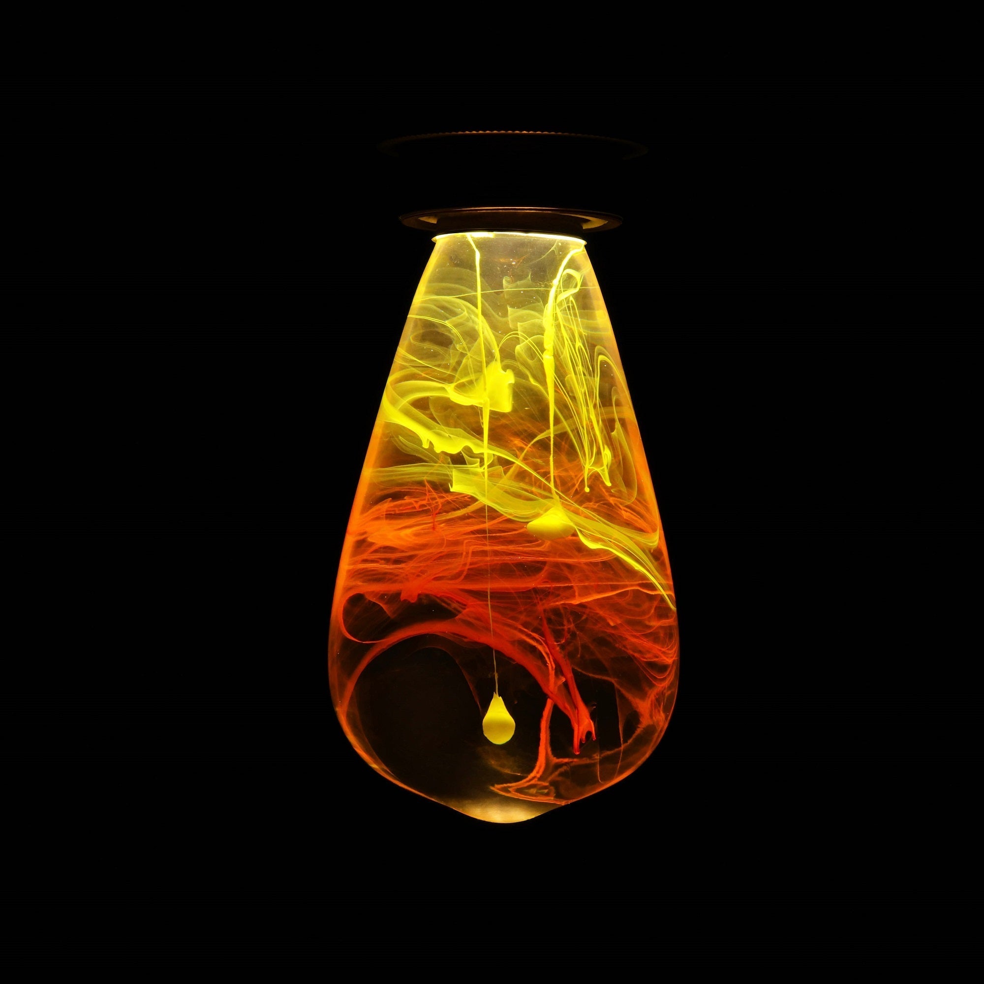 EP Light - Celestial Heat Bundle 3-Pack LED Bulbs glowing with vibrant yellow and orange cosmic resin design.