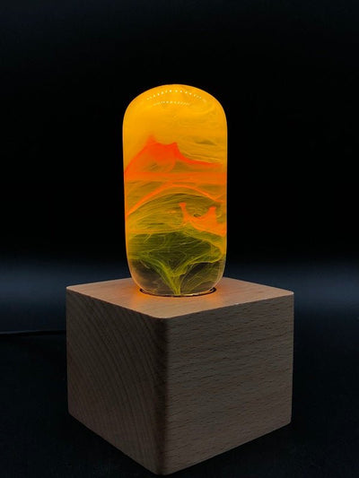 EP Light - Flame bulb glowing amber with handcrafted resin design on wooden base, safe LED ambiance lighting.