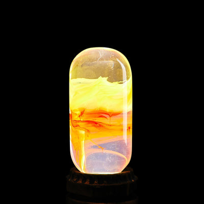 EP Light - Flame bulb with handcrafted eco-resin, LED glow mimicking fire, safe and shock-resistant mood lighting.