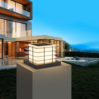Outdoor Solar Fence Post Cap Lights glowing on modern garden post, eco-friendly and dimmable illumination.