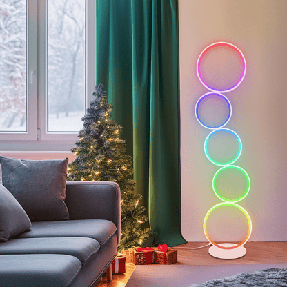 RGB Circle Floor Lamp with vibrant color-changing RGB LED rings brightening a cozy living room corner.