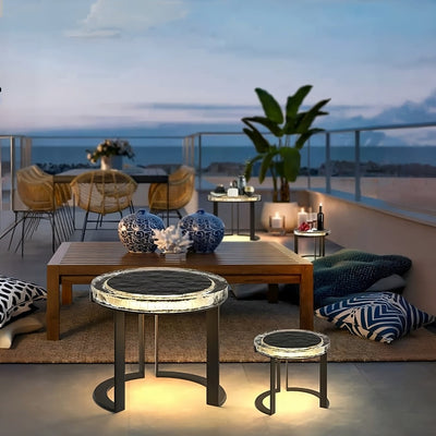 Solar Glow LED Garden Table glowing warmly on patio at dusk, creating stylish, solar-powered outdoor ambiance.